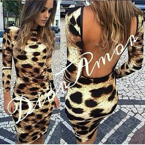 Back out body con cheetah print dress