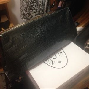 Metallic sage green color clutch