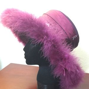 Classic wide brimmed feathery trimmed hat