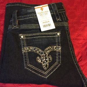 New rock revival curvy midrise skinny 26/34