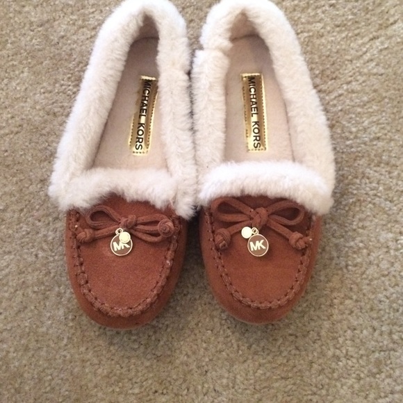 Mk slippers basically new