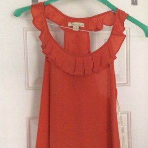 Orange, flowy racer back tank