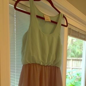 Dress with pleated bottom