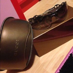 New in box Gucci women's sun glasses.