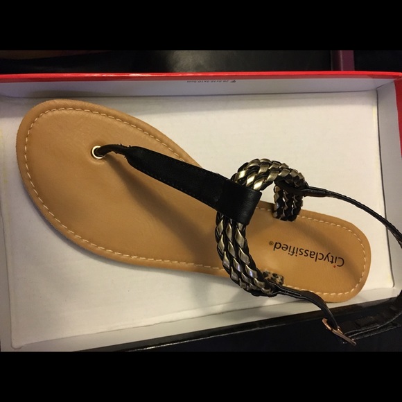 Black and gold sandals