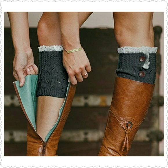 Beige boot cuffs with lace accents.