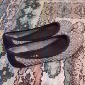 silver and black flats