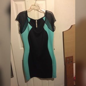 Mint green and black body con dress