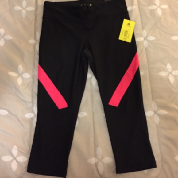 Performance fit capris. Brand new . Size medium