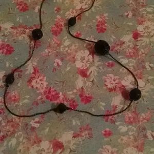 Long black beaded necklace