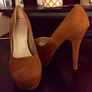 Platform pumps...never worn