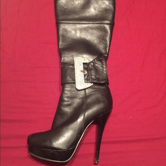 Boots with rhinestone buckle.