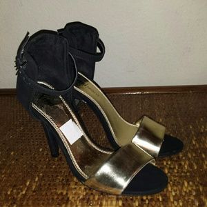 Gold and black strappy heels