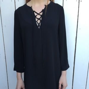 Tie up low V neck dress