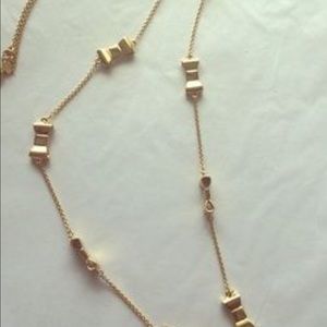 Kate Spade classic gold tone bow necklace