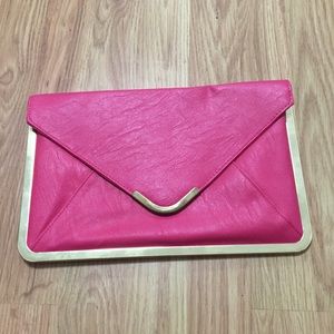 Hot pink envelope clutch with gold trim