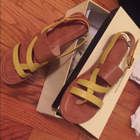 Lime and brown sandals.