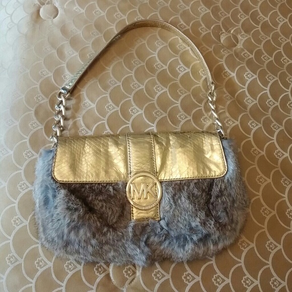 Michael Kors gold and fur hand bag