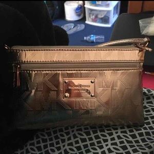 Gold MK wristlet,