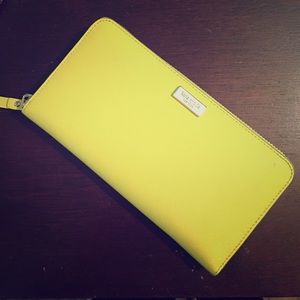 Kate spade! Zip wallet in neon yellow