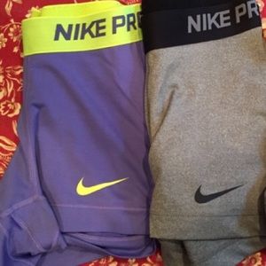 Grey and purple nike pros xs