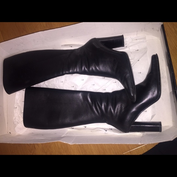 Guess black leather boots size 6,