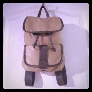 Tommy Hilfiger tan small backpack w/ pewter straps