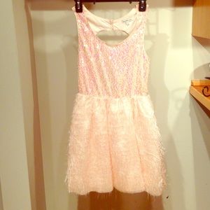 Pink open back sparkle dress with fringe