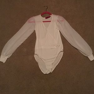 Sheer sleeve body suit