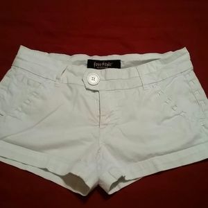 White shorts with stiching on the pockets