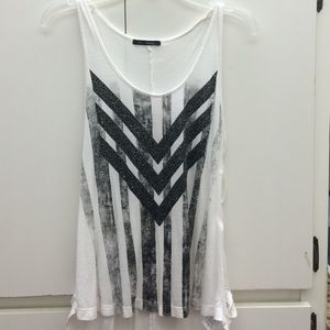 White sleeveless shirt with black design