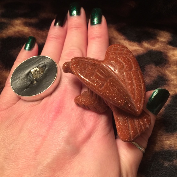 Hand carved goldstone bird