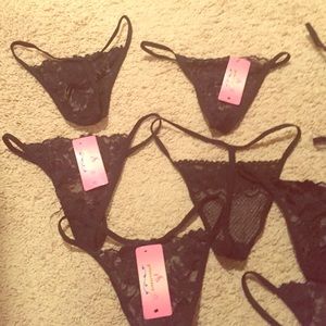 12 pairs of brand new black lace thongs!