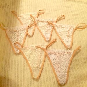 12 brand new sexy lace thongs.