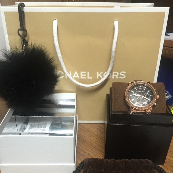 Michael Kors black pompom gunmetal keychain.