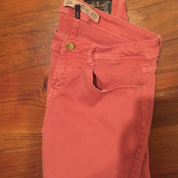 Faded coral jeans