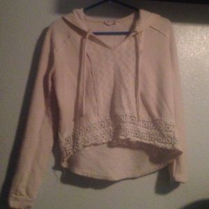 White blouse with hood tassels and lace detailing