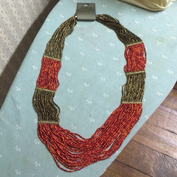 18" orange and gold beaded necklace