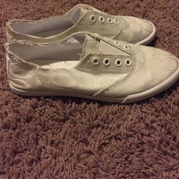 Never worn! white coach slip ons