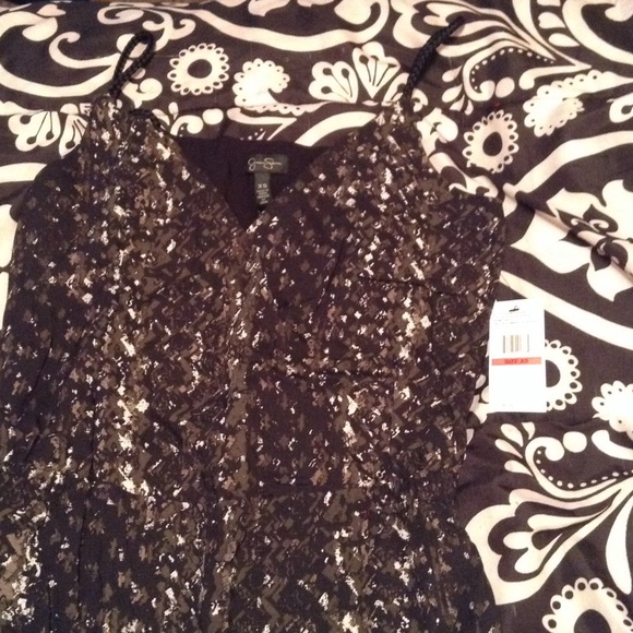 Brand New, never worn. Tags attached