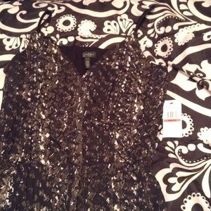 Brand New, never worn. Tags attached