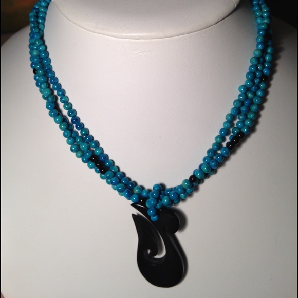 Black Pacific Islander fish icon necklace