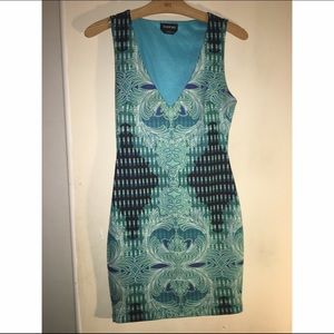 Little cocktail dress with deep plunging neckline.