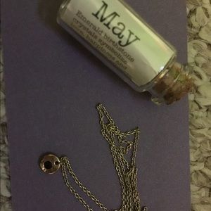 May birth stone necklace.