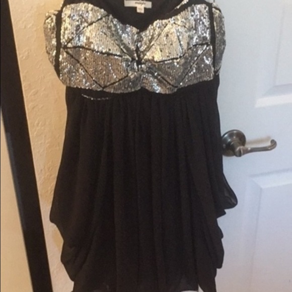 Sequined little black dress
