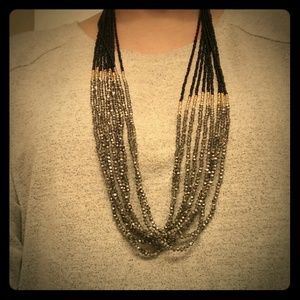 Metallic bead multistrand necklace. NWT.