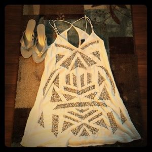 White dress with silver beading. 🍸