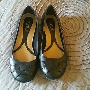 Black leather, geometric design ballet style shoe