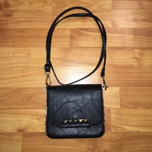 Small black and gold studded bag