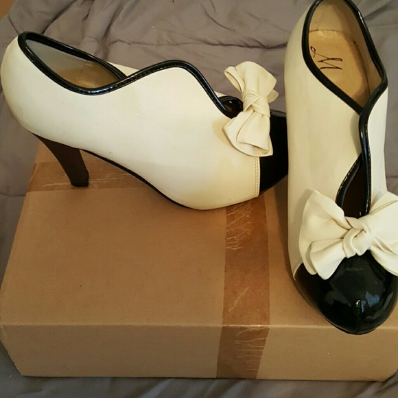 black and cream heels